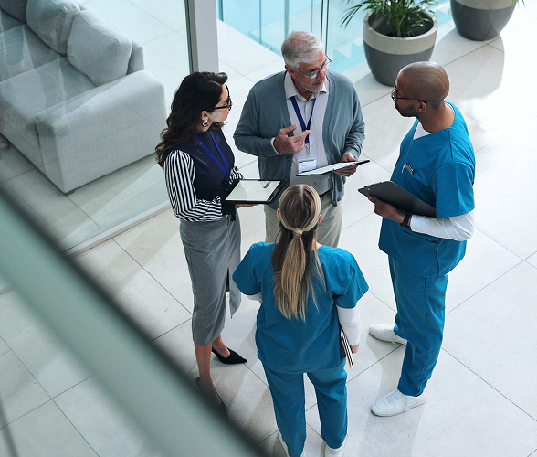 nurses and doctors in a discussion